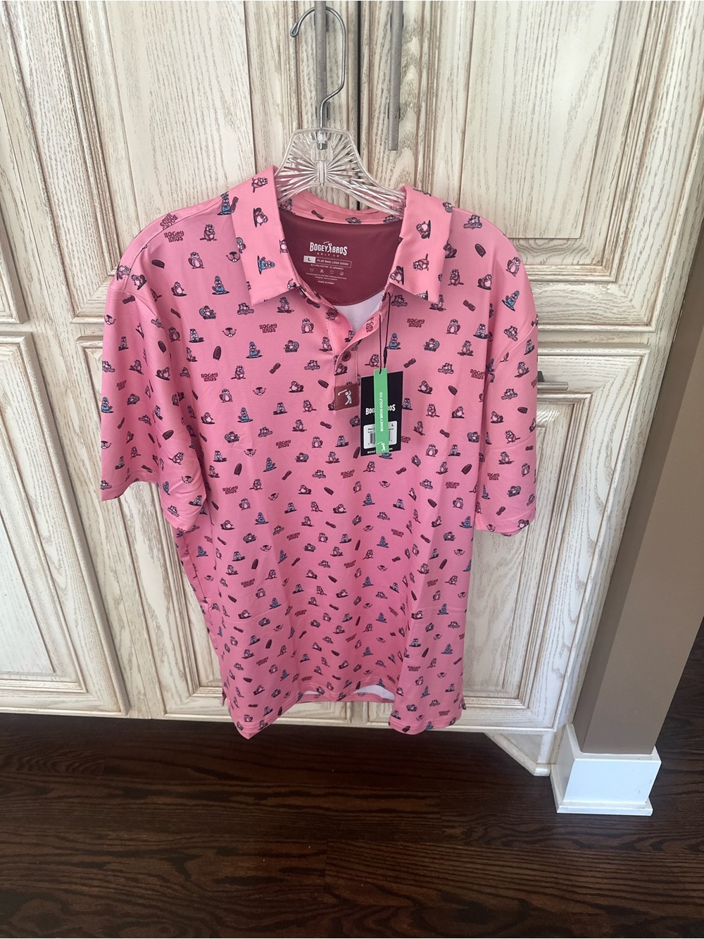 Bogey Bros Golf Co polo shirt features an all-over "Dam Beavers" pattern.